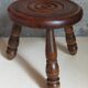 Low tripod stool in vintage turned solid wood