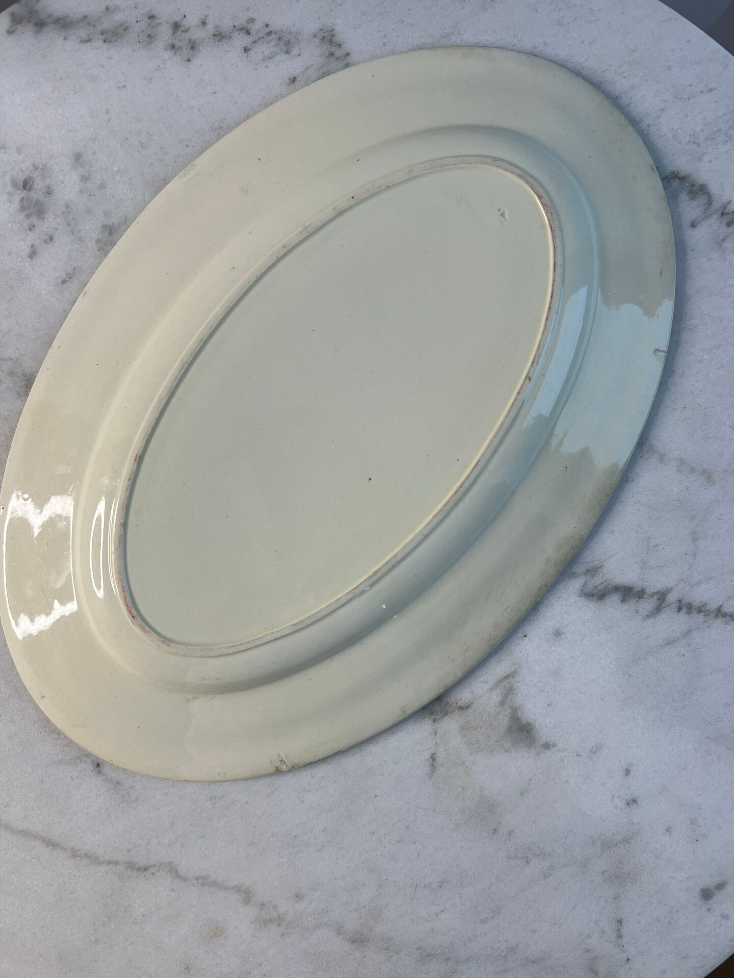 Grand plat ovale en terre de fer 41x27cm
