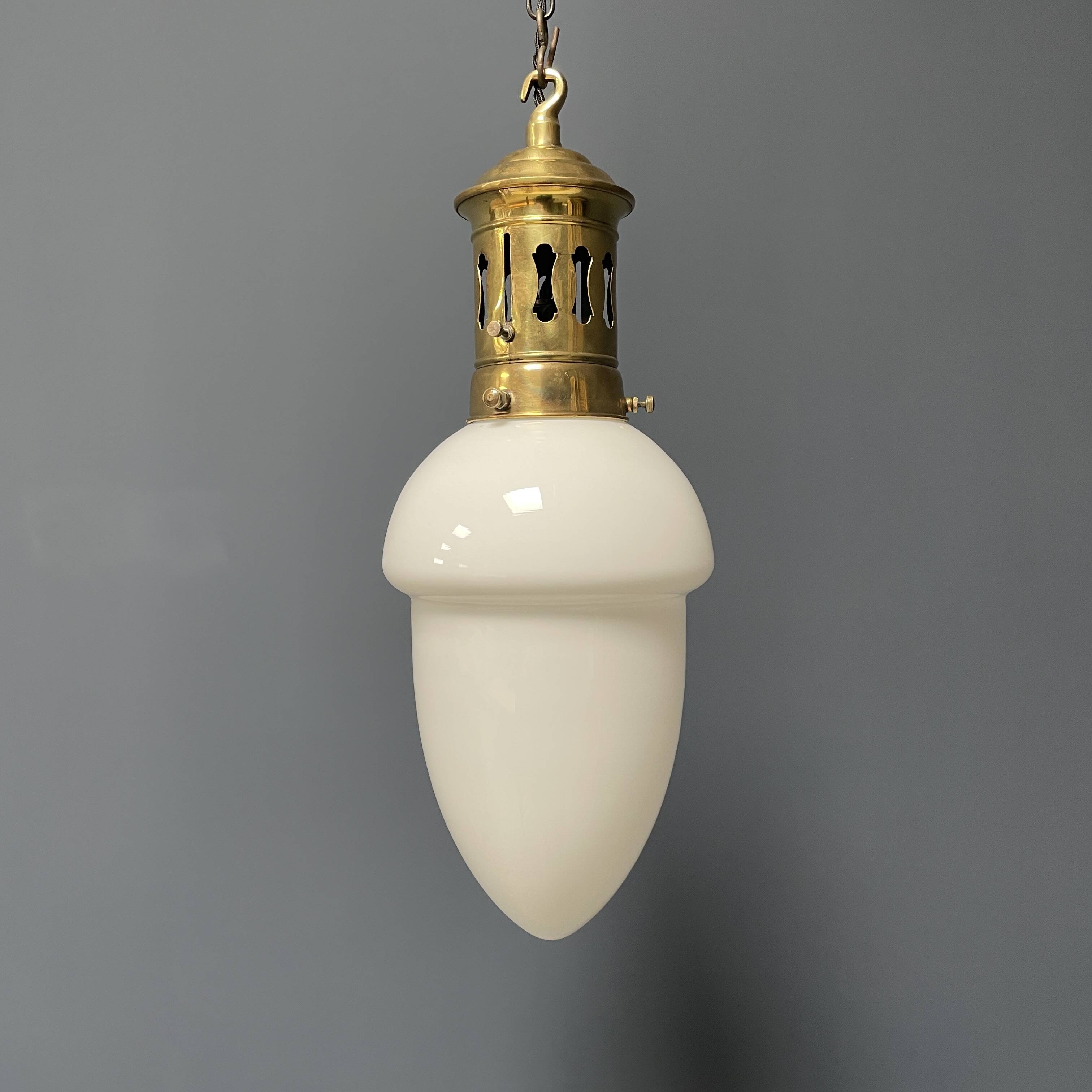 Opaline glass pendant lamp with elegant brass fixture