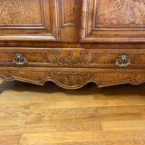 Wedding wardrobe of the Bressan country in walnut and walnut magnifying glass dated 1850