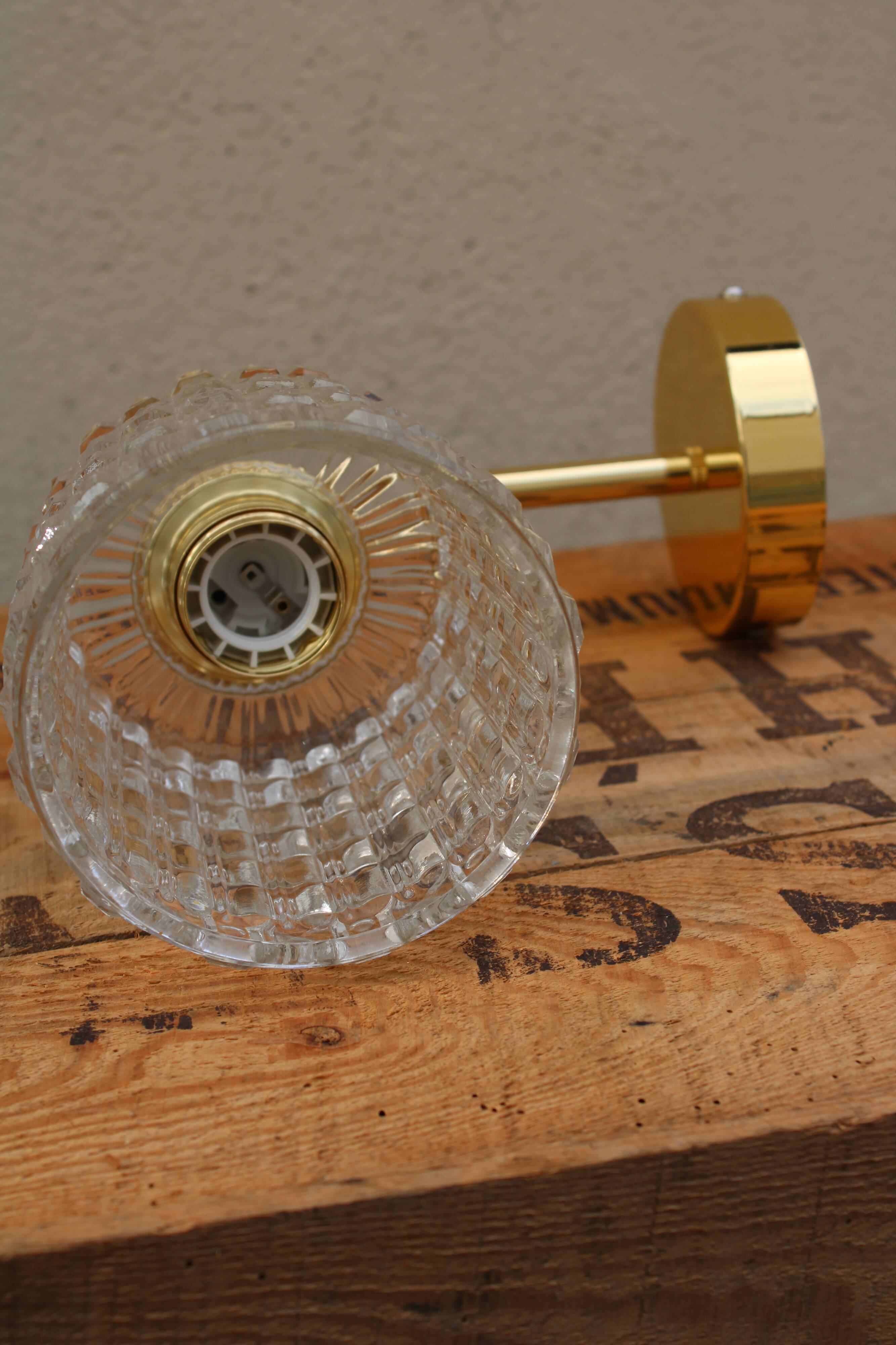 Brass and moulded glass sconce