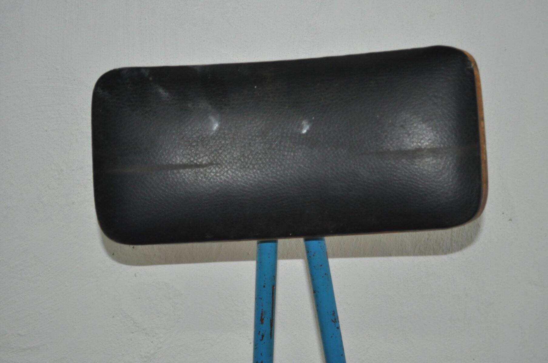 Mid-century industrial chair in metal, leather, and multicoloured wood from the 1960s.