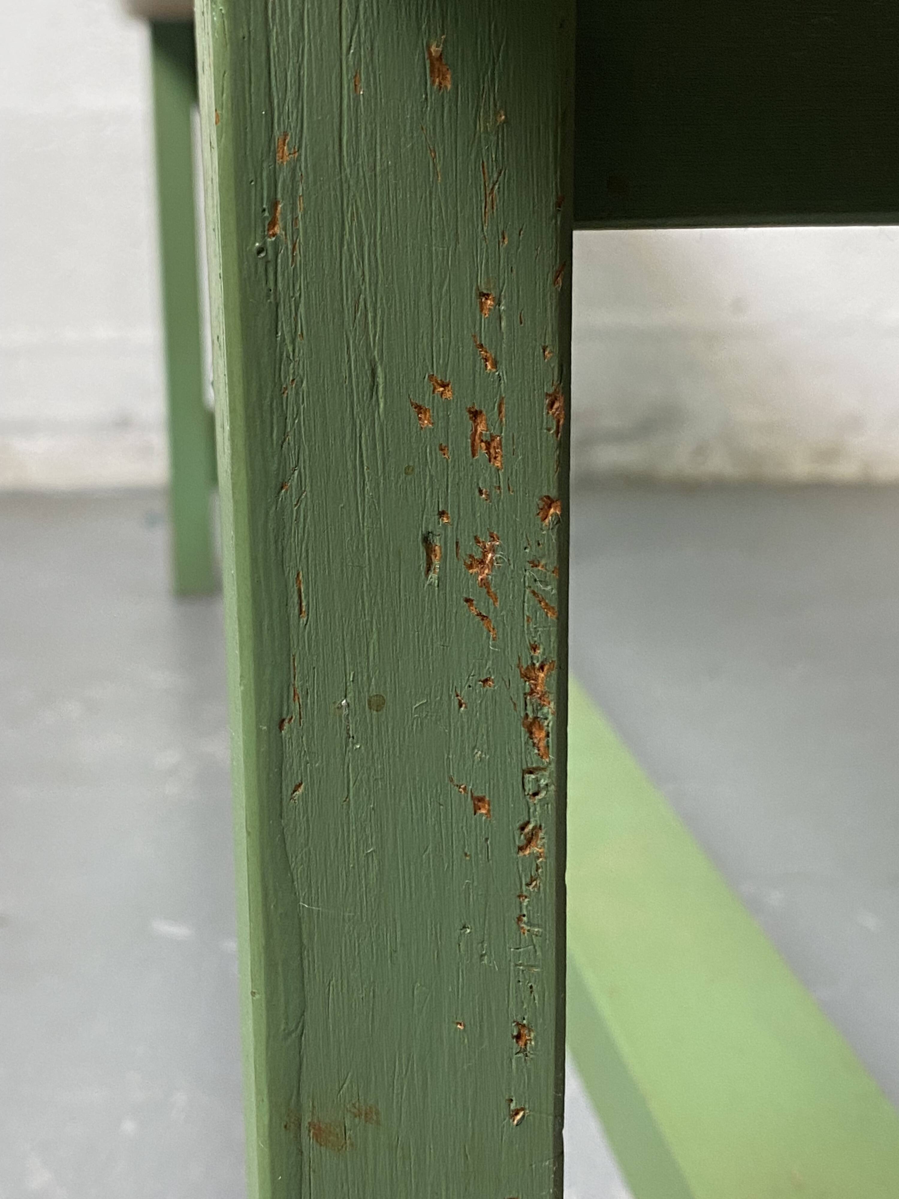 Green wooden bench