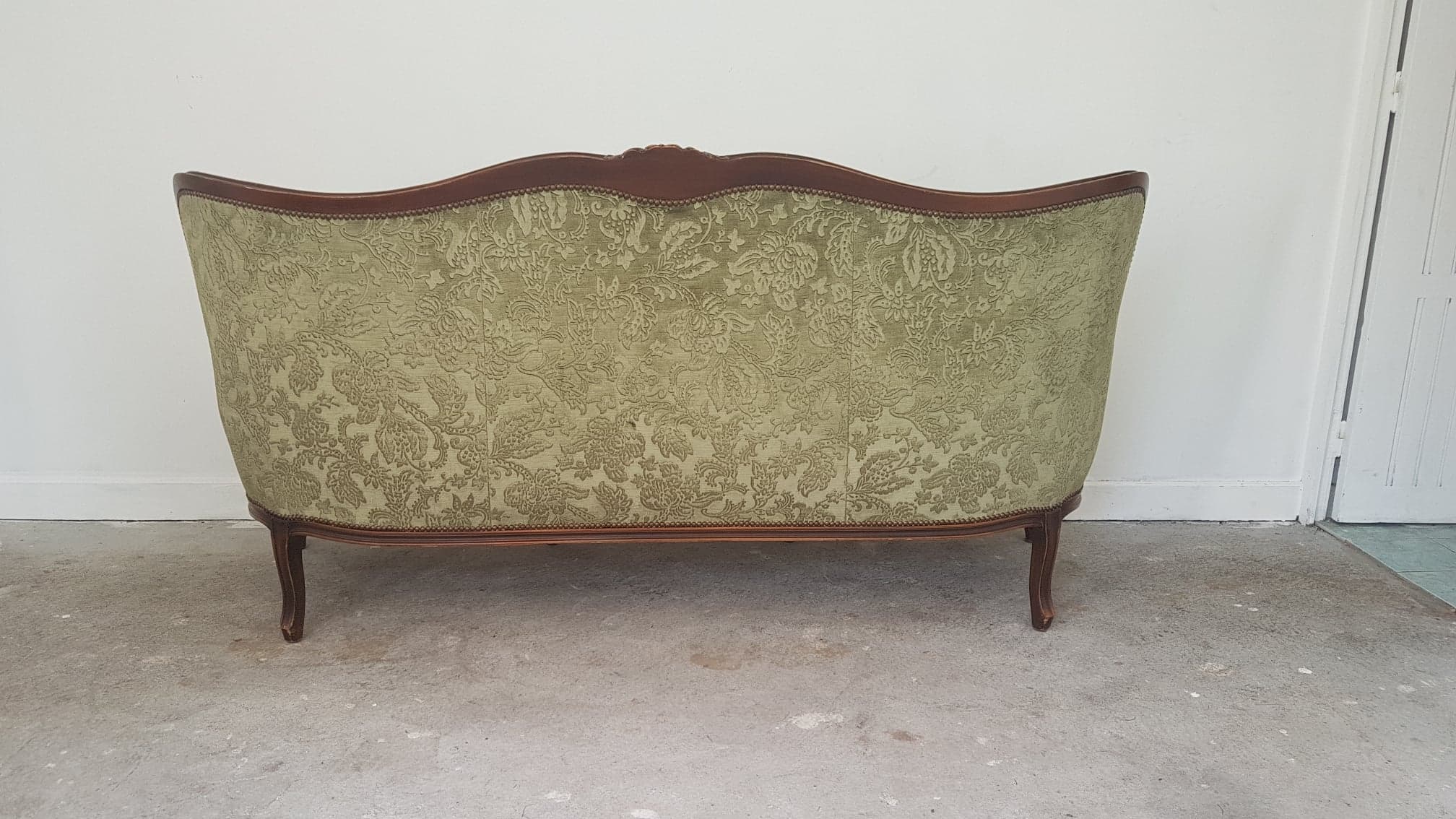 Upholstered sofa in Green Velvet