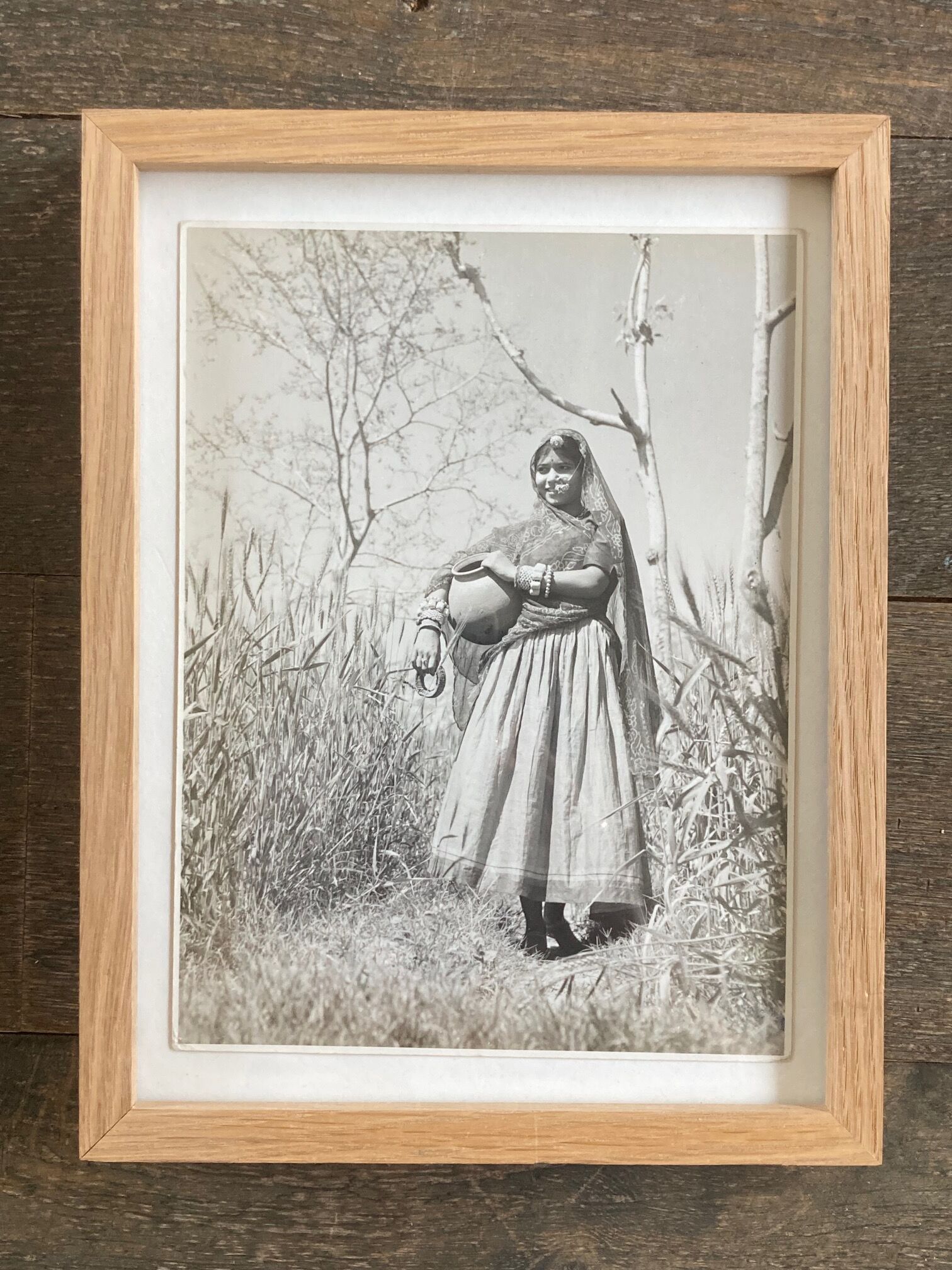 Original photograph by Suraj N. Sharma: young woman and amphora