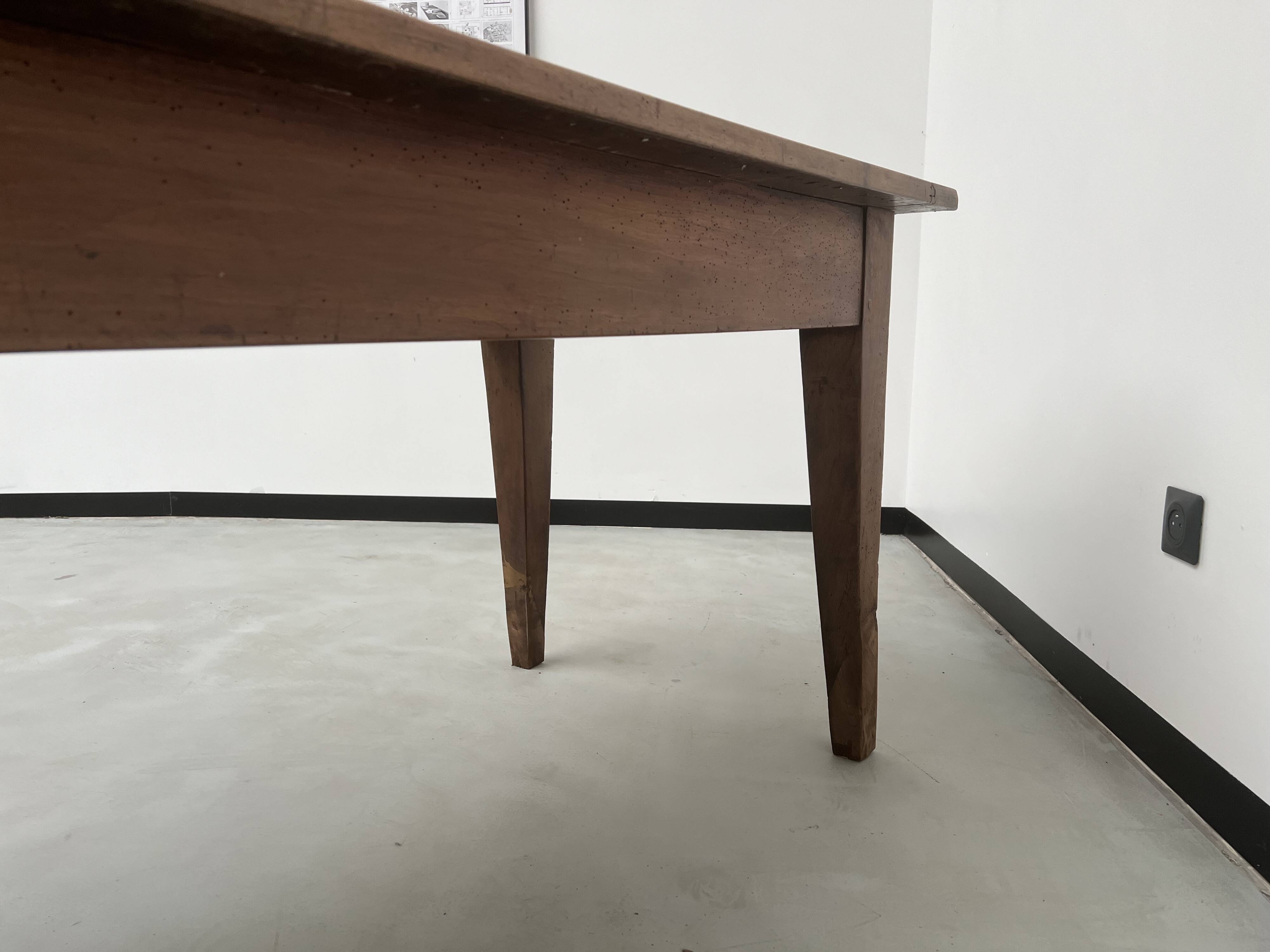 Solid walnut farmhouse table with spindle legs