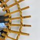 Vintage rattan sunburst mirror from the 1960s
