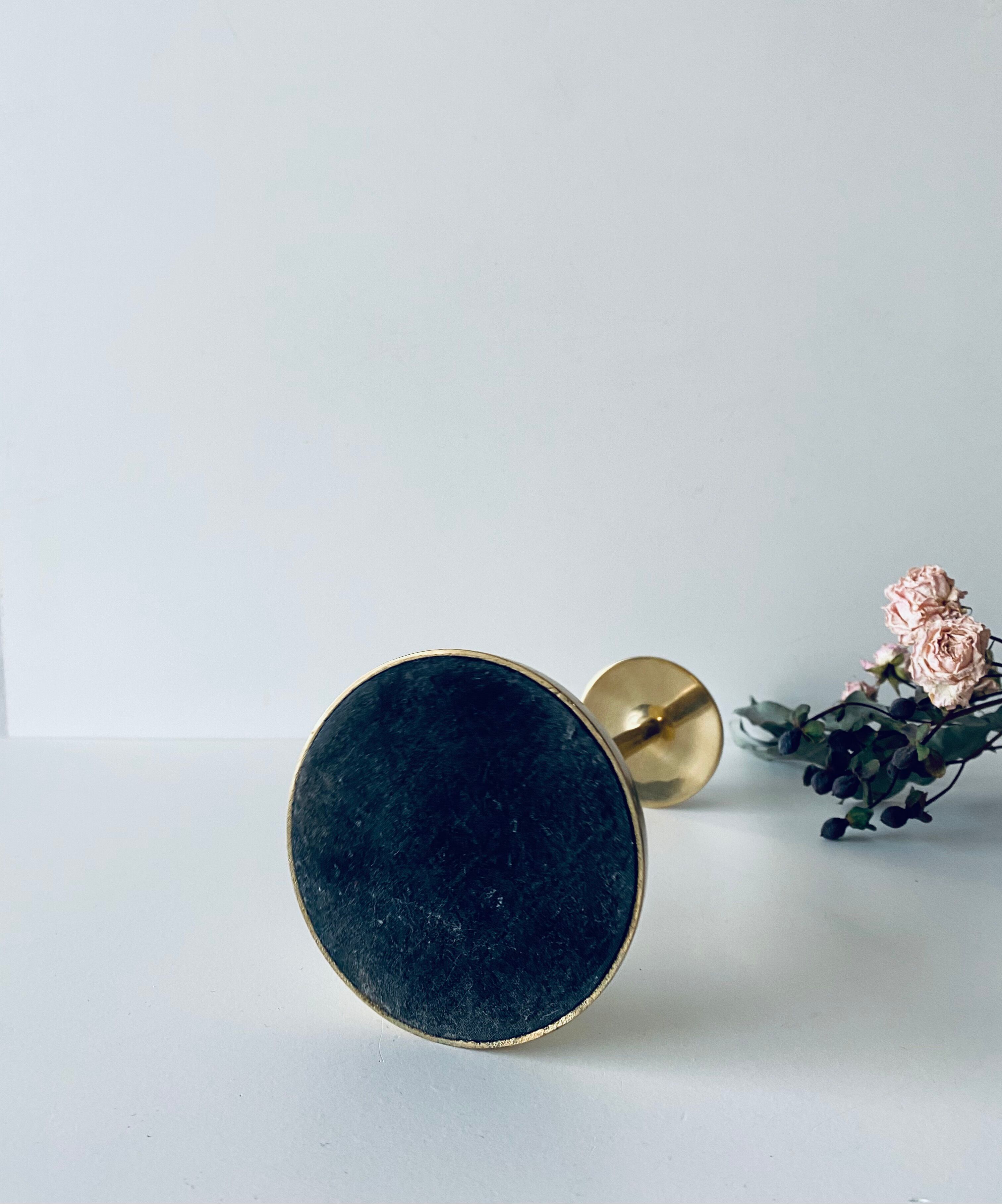 Golden brass candle door