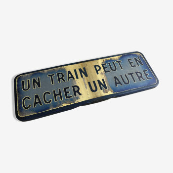 Plaque sncf " un train peut en cacher un autre "