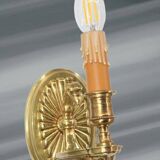 Pair of gilt bronze wall sconces in the Directoire style by Lucien Gau.