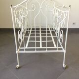 White wrought iron folding bed