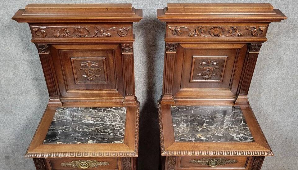 Pair of Renaissance style bedside tables in carved walnut, 19th century