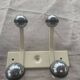 Industrial wall coat rack two hooks in white lacquered metal and vintage silver 1970