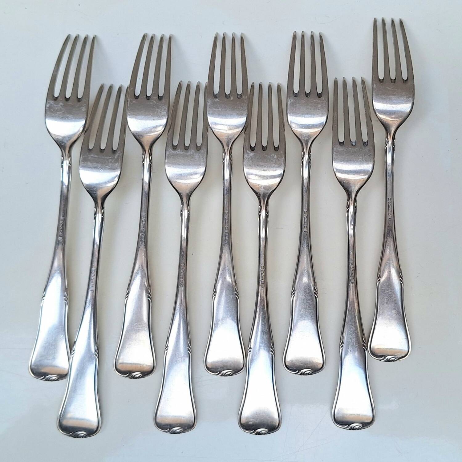 Set of small silver-plated metal forks