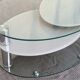 Coffee table with rotating glass tops by Antoine Motard.