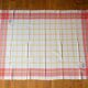 Old tablecloth and 11 towels crossed red blue