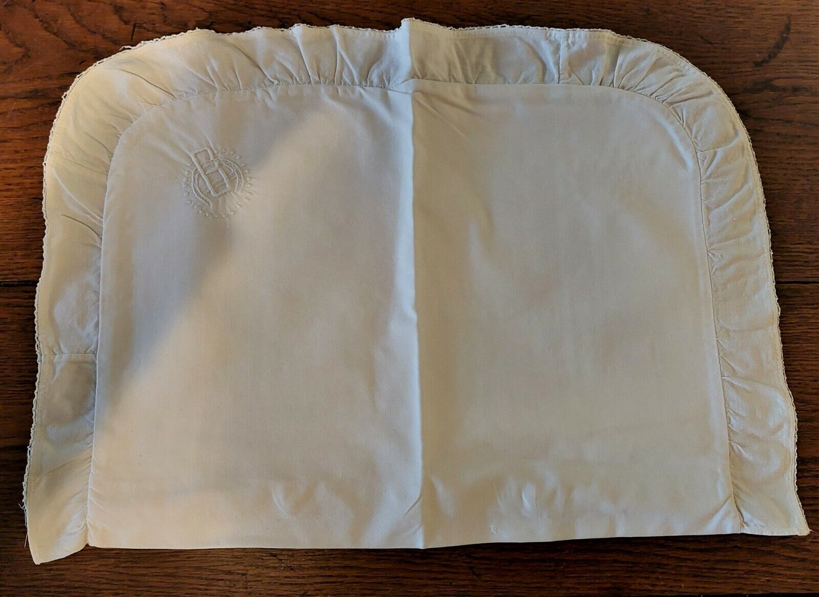 White cotton cushion or pillow case embroidered monogram and ruffle