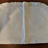White cotton cushion or pillow case embroidered monogram and ruffle