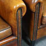 Set of 2 club chairs in black piping sheep leather