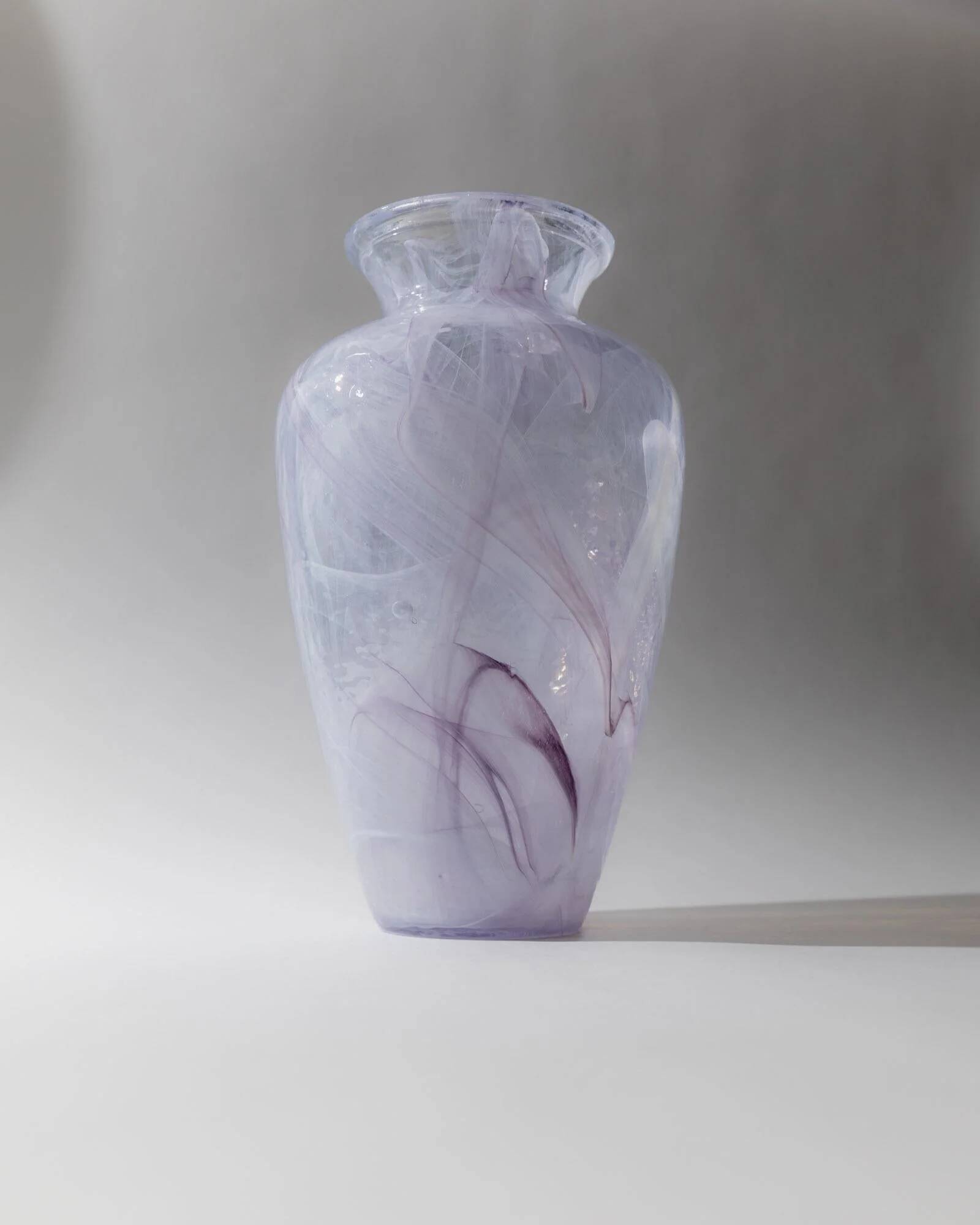 Vintage Murano glass vase from the 1970s, lilac and white swirl.