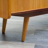 1950s low sideboard in ash, black formica surface. Professionally restored