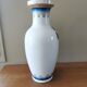 Vintage ceramic vase with Asian decor.