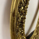 Large format golden oval frame