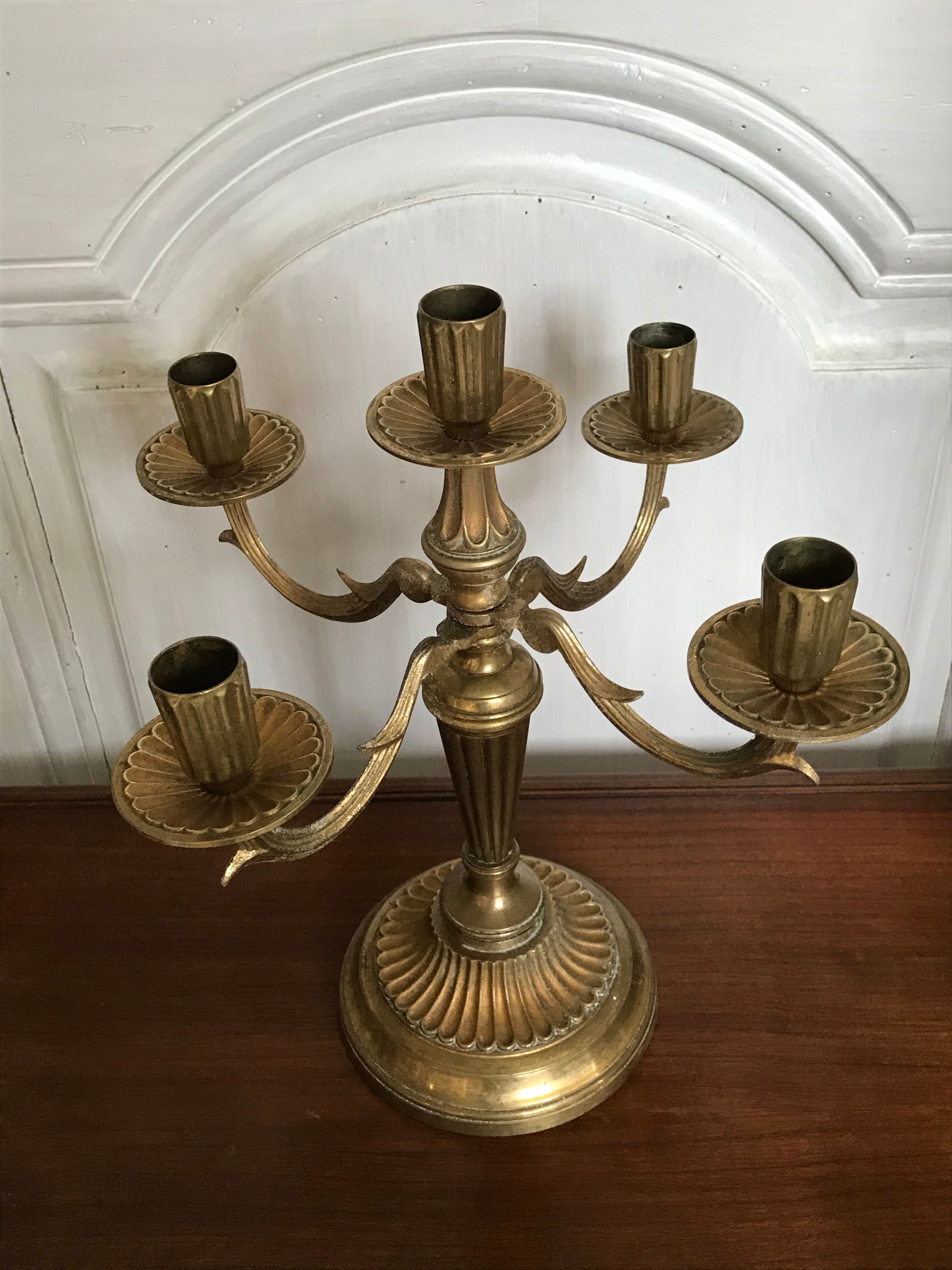 Pair of golden brass candlesticks