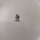 Set of 11 plates, Baudour porcelain