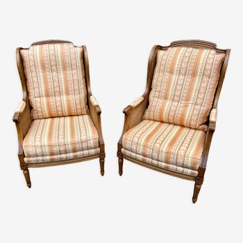 Pair of armchair Bergères style Louis XVI with wooden ears and canning 1970s
