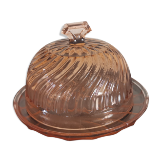 Old cheese bell with its pink glass top
