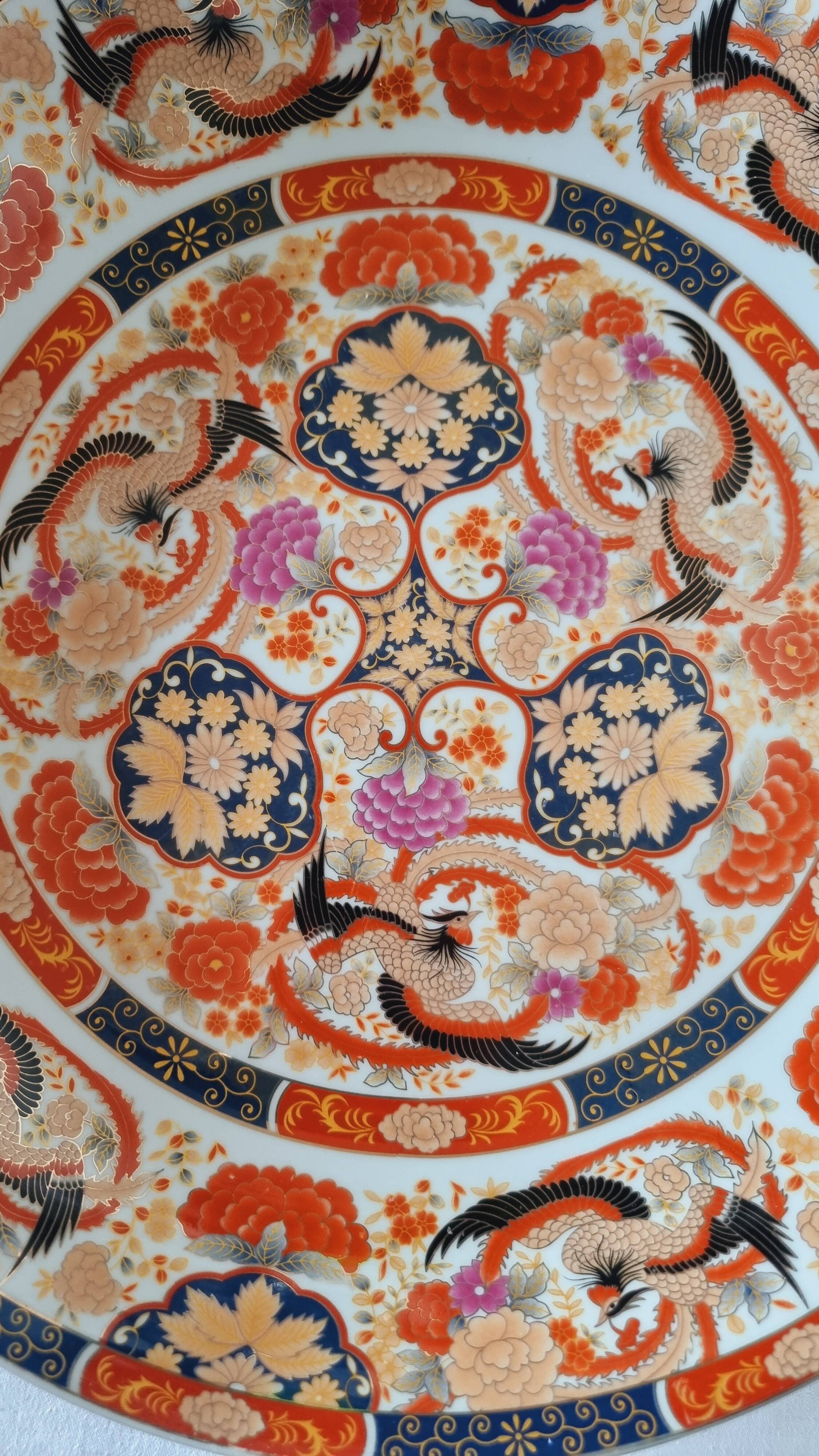 Large deep porcelain plate in Imari style (35.5 cm) with "Phe" decoration.