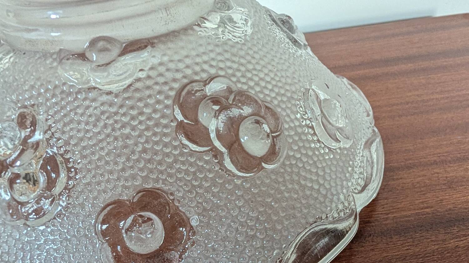 Moulded glass lampshade with floral decoration, granite texture.