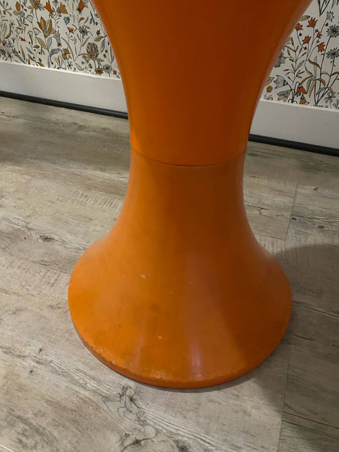 Orange tam-tam by Stamp with integrated pocket.