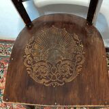 Antique bistro chair with pattern