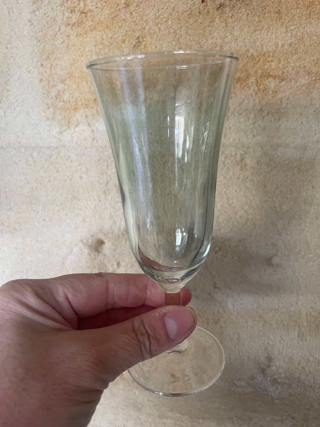 3 iridescent colored champagne glasses