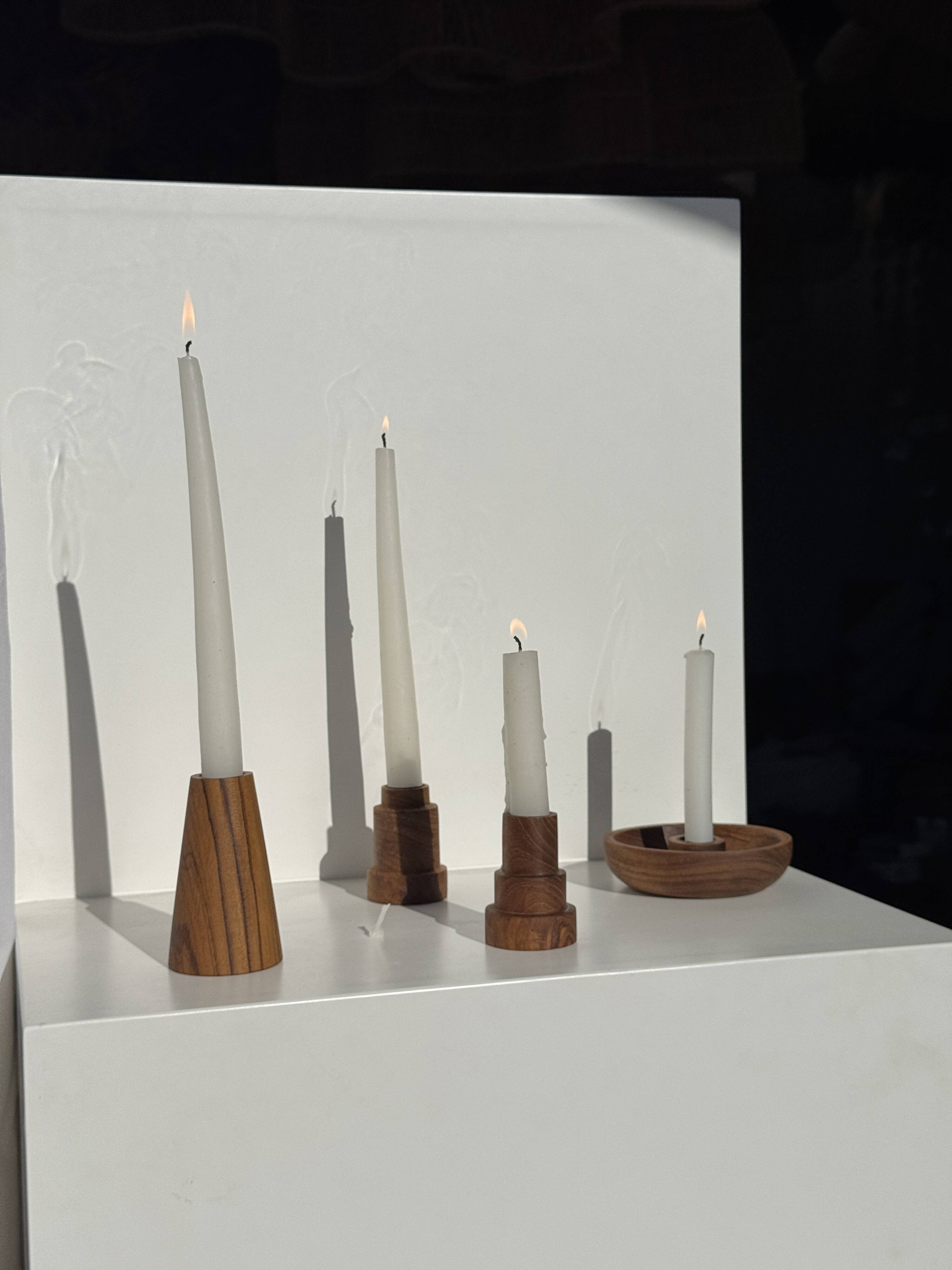 Pyramidal circular teak monoxyle candlestick H7 D5