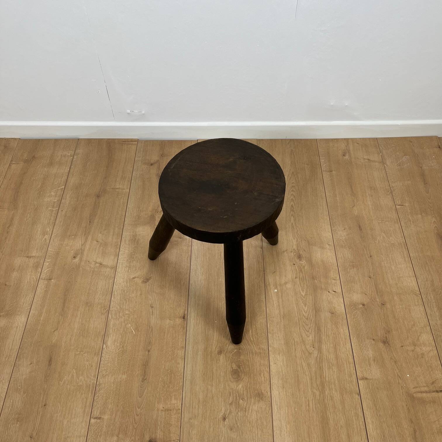 Small brutalist tripod stool in solid wood, 1960