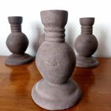 Four vintage handcrafted candle holders