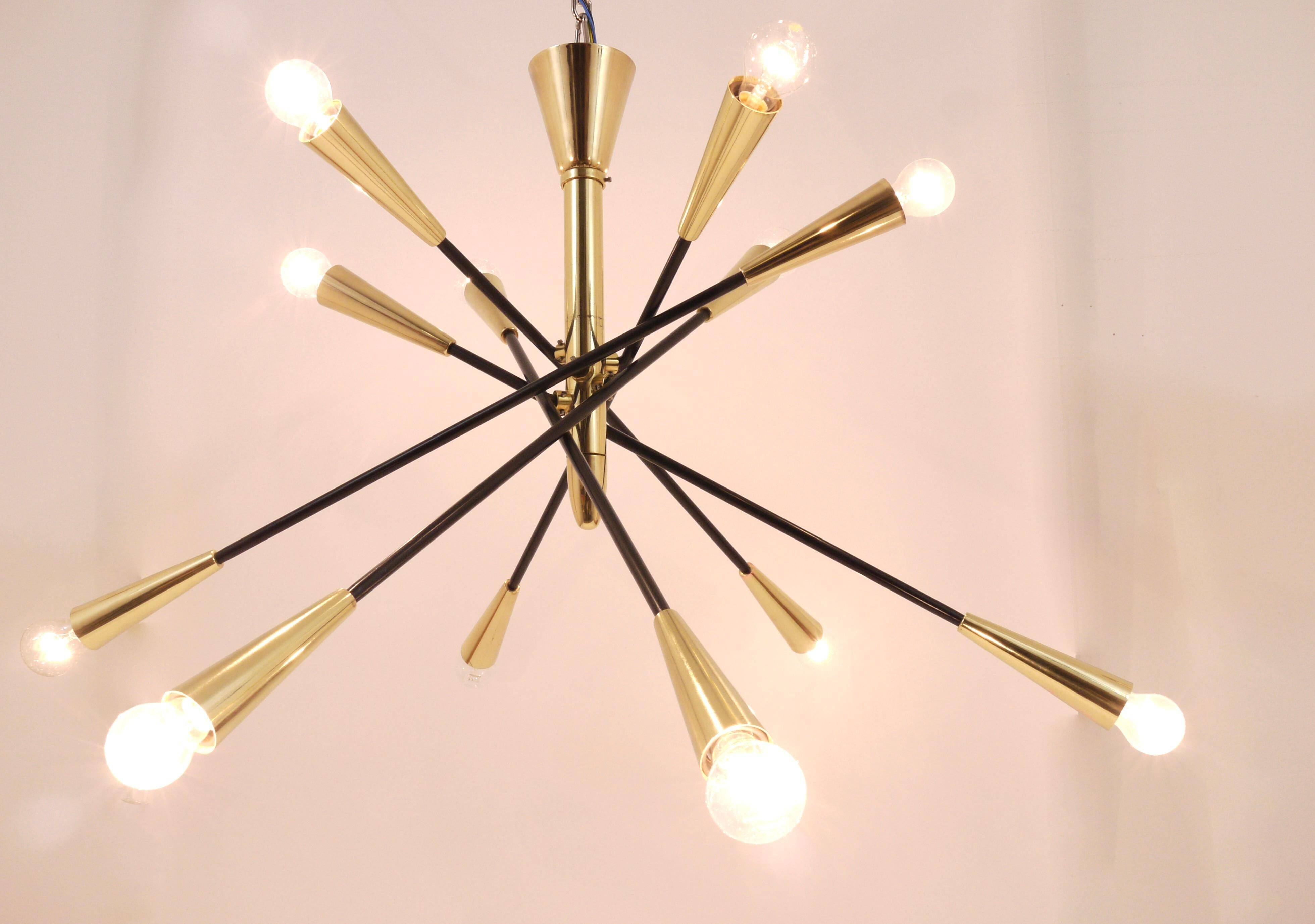 Black and brass articulated Sputnik chandelier in Stilnovo style, Italy, 1950.