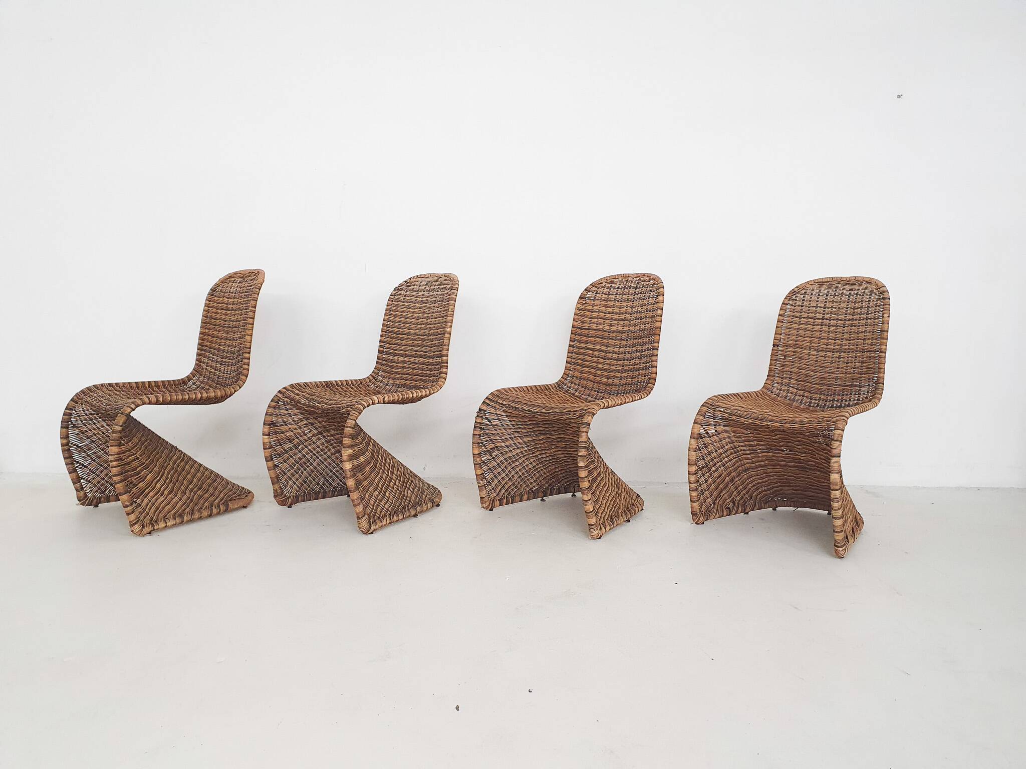 Set of four rattan S-chairs