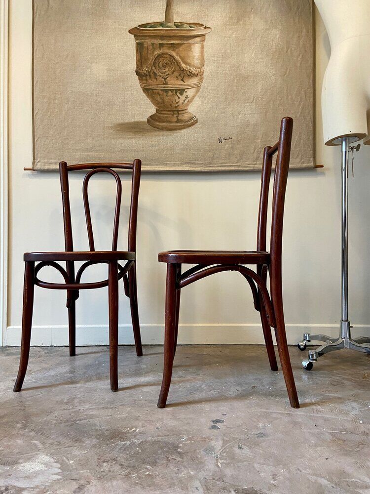 2 bistro chairs in arched and dark wood