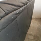 Pair of black leather armchairs from the 80s