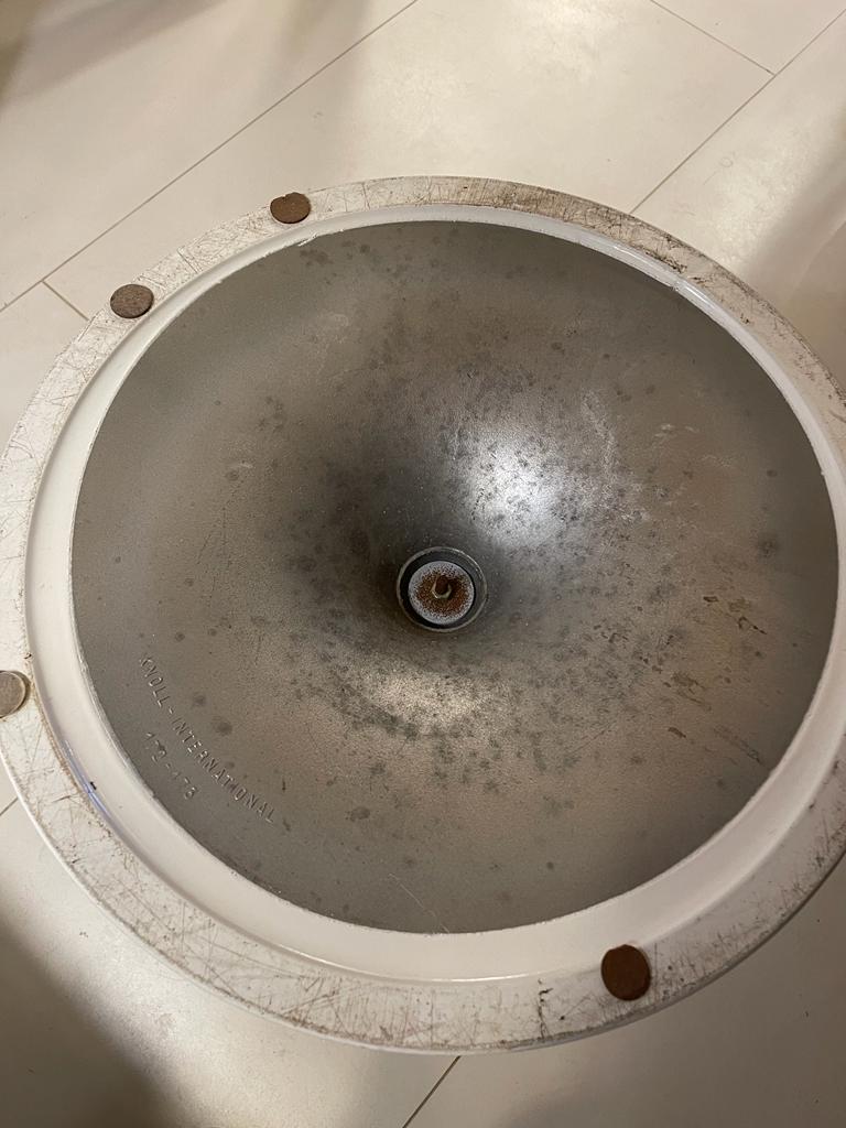 Round table in red marble by Eero Saarinen for Knoll