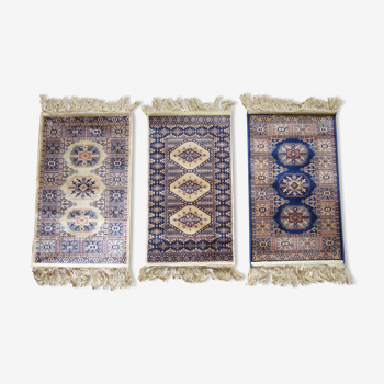 Three oriental carpets 35 x 70