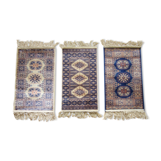 Three oriental carpets 35 x 70