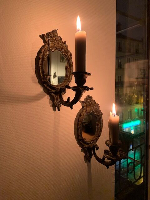 Pair of antique bronze candle holders