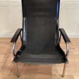 Pair of black leather reclining relaxation armchairs, "Hans Eichenberger" design, 19
