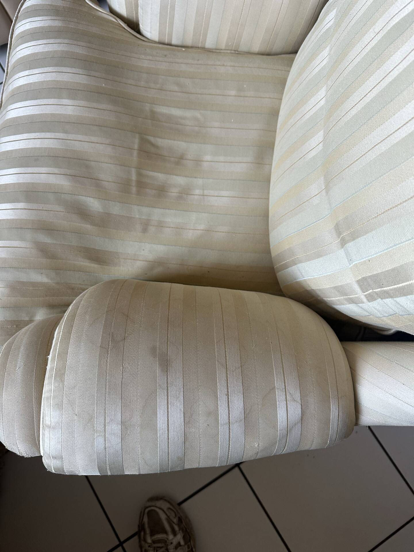 Pair of vintage bergère armchairs in striped ecru and beige fabric.