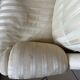 Pair of vintage bergère armchairs in striped ecru and beige fabric.